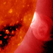 Coronal mass ejection from behind the solar limb