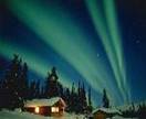 photo of Log Cabin With Northern Lights